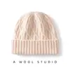 Venta al por mayor del fabricante de nuevos modelos de otoño e invierno% Gorro de punto acanalado de cable de lana australiana con puño, engrosado y cálido, en color verde terciopelo