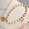 Pulseira de Bênção de Pérola de Contas Pulseira de Ouro Areia de Latão Design de Corda Elástica Ajustável Feminina Pulseira Simples Atacado