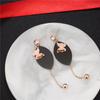Aretes creativos de acero de titanio color oro rosa para mujer, aretes colgantes tridimensionales de mariposa esmerilada, aretes estilo coreano, aretes de exportación