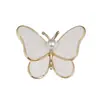 Broche de mariposa blanca de alta calidad anti-fritillary Perla anti-luz pasador corsage punto de fábrica al por mayor accesorios para ropa