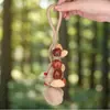 Campanilla de mano con forma de cáscara de fruta indonesia de planta natural, colgante para bolso, instrumento de terapia de sonido curativo, carillón de viento, adorno para colgar en el coche, llavero