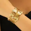 Pulseira Aberta Estilo Europeu e Americano Folha de Leque Oca Dourada, Anel de Braço de Metal Personalizado de Luxo Leve, Nova Joia de Moda Transfronteiriça