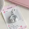 Ins Simple Dulce Fresco Auriculares Tridimensionales Llavero Colgante Creativo Viento Frío Bolso Colgante Joyería Regalo para Novia Venta al por Mayor