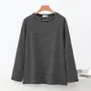 Nova camiseta feminina listrada de manga longa e gola redonda Outono/Inverno 2026, versátil, casual, modelagem solta que afina, camisa básica