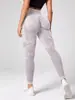 Novidade transfronteiriça mais vendida calça de yoga sem costura oca roupas Cintura alta Levanta bumbum pêssego calças de ginástica femininas lavadas foscas justas