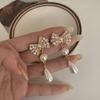 Aretes de Nudo de Lazo de Perlas con Incrustaciones de Diamantes de Aguja de Plata 925 Collar Estilo Ins Popular en Internet Aretes Elegantes de Moda Cadena para Clavícula