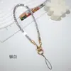 Nueva correa de muñeca larga de cristal de venta caliente transfronteriza, correa corta de teléfono con diamantes de imitación, llavero de moda