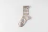 Calcetines Rayados de Bloques de Color Sin Costuras con Puño Doble Estilo Miu Etiqueta de Letra de Moda con Puño de Burbuja de Malla Calcetines de Caña Media