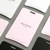 Etiqueta de Pendurar Simples Nova de Alta Qualidade com Fecho Anti-Violação Etiqueta de Pendurar Personalizada para Roupas Etiqueta de Roupas Personalizada para Homens e Mulheres Personalização