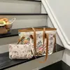 Lindo Elegante Nuevo Conjunto de Dos Piezas Gran Capacidad Estampado de Graffiti de Dibujos Animados Bolso de Hombro Único Versátil de Moda para Salir