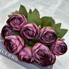 Nueva Rosa de boda artificial transfronteriza Rosa de té de 9 cabezas tela recubierta flor falsa hogar sala de estar mesa de centro arreglo floral de escritorio