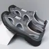 Explosões transfronteiriças sapatos de praia masculinos verão novo malha respirável oca sapatos de pai sandálias para dirigir ao ar livre
