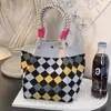 Bolso de Mano Tejido de Punto de Nuevo Estilo Transfronterizo con Diseño de Flor Hueca, Bolso de Regalo Tejido Simple y Versátil de Gran Capacidad