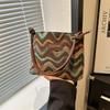 Bolsa de moda feminina axila 2024 nova primavera retro contraste cor tecido balde bolsa de ombro de alta qualidade bolsa crossbody