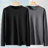 Camiseta fina de manga larga para hombre para otoño, color liso, elástica, secado rápido, corte holgado, cuello redondo casual moderno, camiseta interior