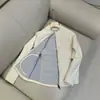 Chaqueta acolchada de retazos de lana de corte entallado con cuello alto para otoño e invierno para mujer 13132