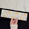 Tienda de Postres 30 Piezas de Uñas Portátiles con Perlas de Vidrio y Efecto Ojo de Gato, Nuevas Puntas de Uñas Pre-hechas al por Mayor