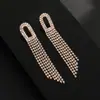 Cadena de garra aretes de borla de diamantes completos para mujer aretes simples de moda aretes de escenario para fiesta al por mayor E825