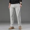 Pantalones casuales de alta gama para hombre de Hong Kong, nuevo estilo otoño 2026, pantalones rectos holgados elásticos para hombres de mediana edad