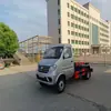 El Camión de Basura Dongfeng Xiaokang Marca Azul con Brazo de Gancho Cuadrado de 3 m³ Ya Está Disponible para el Camión Volquete de Gasolina de Seis Ruedas Dongfeng de 112 Caballos de Fuerza