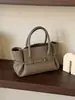 Bolso de mano de cuero de diseño estilo coreano 2026 con hebilla, bolso de piel de vaca, bolso bandolera retro de un solo hombro para mujer, gran capacidad