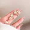 Pendientes Florales Frescos Estilo Bosque para Mujer 2026 Nuevo Diseño Lujo Ligero Nicho de Gama Alta Pendientes de Perla