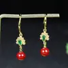 Venta al por mayor del fabricante Exquisitos Pendientes Incrustados de Cinabrio Arena de Mineral Crudo Alto Contenido Arena de Oro Púrpura Pendientes Incrustados de Diamante Chapados en Plata