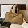Bolsa de Lona Versátil Simple Estilo Coreano para Mujer 2026 Otoño/Invierno Nuevo Lanzamiento Gran Capacidad Casual para el Trabajo Bolso de Hombro Único