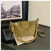 A bolsa de dumpling trançada popular deste ano para mulheres é a nova bolsa de ombro simples da moda de 2026, uma bolsa transversal de nicho estilo coreano