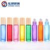 En stock transfronterizo 10ml tapa de grano de madera botella de vidrio de color con bola rodante botella de aceite esencial botella de perfume botella de bola rodante para crema de ojos y aceite de labios