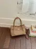 Bolso pequeño vintage transfronterizo para mujer, modelo nuevo 2026, bolso tipo cubo de alta gama, bolso cruzado de moda para el día a día