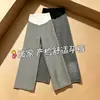 Calça de maternidade para primavera e outono, modelagem solta, calça pantalona listrada que afina a silhueta para grávidas, adequada para uso ao ar livre sem apertar a barriga, moda gestante para o outono