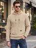 Moletom com capuz masculino transfronteiriço, suéter de malha jacquard texturizada TK primavera/outono de manga comprida com bolso canguru e cordão com etiqueta de couro