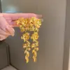Brincos de borla com folha de flor dourada Brincos de metal exagerados estilo europeu e americano brincos da moda de alta qualidade brincos para mulheres