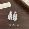 Venta caliente transfronteriza Europa y América pendientes de liquidación full diamond industria pesada sensación de alta gama temperamento único pendientes de botón para mujer joyería para orejas venta al por mayor