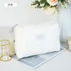 Nueva bolsa de maquillaje nube de viaje de alta gama, neceser, bolsa de viaje de Instagram, neceser grande de capacidad simple y portátil