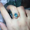 Anillo para Mujer de Moissanita de Corte Ovalado Colorida de 2 Quilates, Chapado en Oro Plata, Venta al por Mayor, Colorido, Nuevo Modelo Popular Europeo y Americano