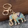 Llavero de elefante con pedrería transfronterizo, colgante de accesorio para coche de metal, llavero creativo estilo coreano, pequeño regalo de Navidad