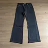Suministro transfronterizo exclusivo de jeans acampanados de cinco botones con cierre de botón diagonal para hombre y mujer, corte slim, estilo holgado, pantalones de color oscuro retro americano