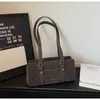 Bolsa Vintage de Nicho Melard para Mulheres Outono e Inverno 2025 Nova Versátil de Alta Qualidade para Ombro e Mão Bolsa Saco