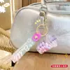 Chaveiro criativo e moderno de copo de milk tea arco-íris e garrafa de areia líquida, acessório fofo para bolsa, chaveiro requintado para carro