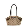 Bolso de axila para mujer estilo coreano, chic y discreto, colección 2026, con un moderno diseño de lunares, un bolso de hombro popular y elegante