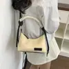 2026 Verão Novo Estiloso Individual Fashionável Nicho Chique Casual Textura Simples Ombro Único Transversal Portátil Bolsa Feminina