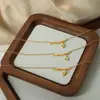 Nova corrente com pingente geométrico de bambu banhada a ouro 18K de aço titânio de alta qualidade, design simples de nicho transfronteiriço, joia feminina