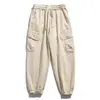 Macacão elástico estilo coreano novo para primavera e outono, calça casual da moda, mesmo estilo de celebridade da internet para casais, calça estilosa com múltiplos bolsos