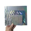Textura Transfronteriza en Stock 250g 10 Tipos de Cartón con Patrón Láser Cartulina Plateada Papel Metálico A4 Láser Fantasía Especial