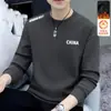 Sudadera con cuello redondo y forro polar para hombre, marca de moda de otoño e invierno, prenda interior versátil holgada de manga larga, atuendo unisex para pareja, top para estudiante
