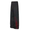 Jeans de mezclilla originales de microcampana para hombre, pantalones largos casuales rectos versátiles, con letras florales bordadas en contraste negro y rojo, modernos