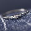 D054 Europeo y Americano deseo más vendido temperamento simple incrustación tres diamantes cobre circonita anillo de unión joyería directa de fábrica