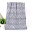 Venta al por mayor de fábrica toalla jacquard gruesa rota toalla facial grande toalla facial absorbente pareja adulta puesto de mercancía con logo